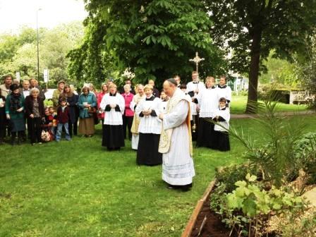 Fr Kevin blessing the Bible Garden